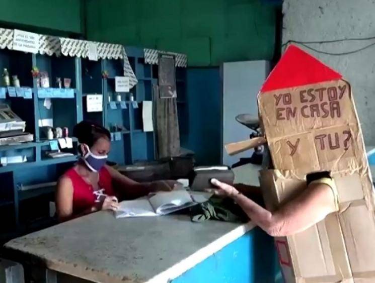 82-year-old Cuban woman wears cardboard box for protection against coronavirus