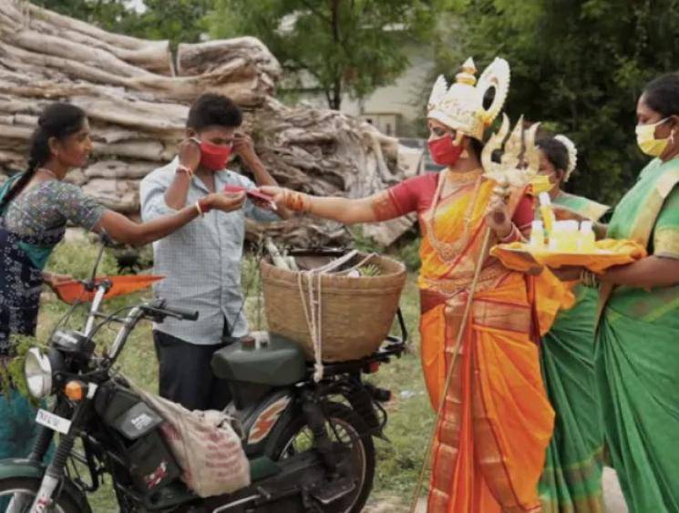 Tamil Nadu woman distributes coronavirus masks by dressing up as Goddess Mariamman