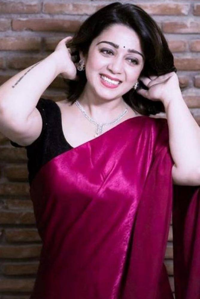 Charmme Kaur - Photos Stills Images Charmme Kaur - Photos Stills Images