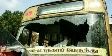 Chennai youth breaks window of MTC bus Tamil Nadu