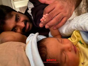 Vijay's adorable cute moment with his newborn son! Check out the sweet picture here!- 